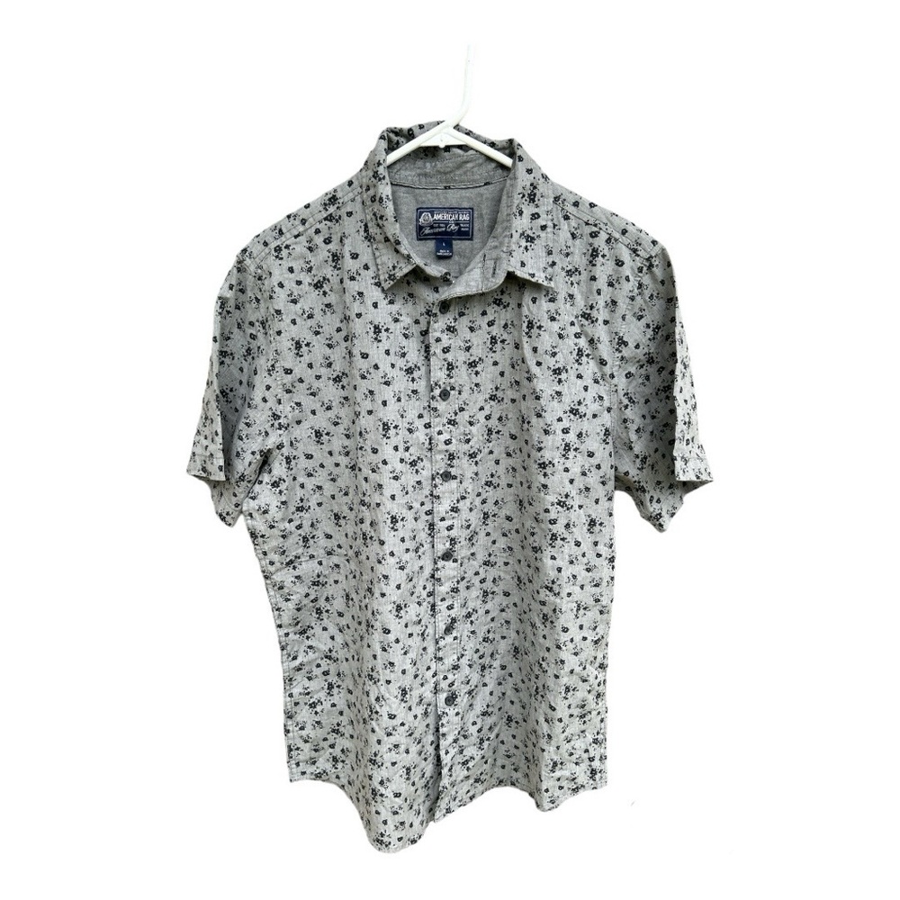 Gray with black flowers short sleeve button up shirt.
